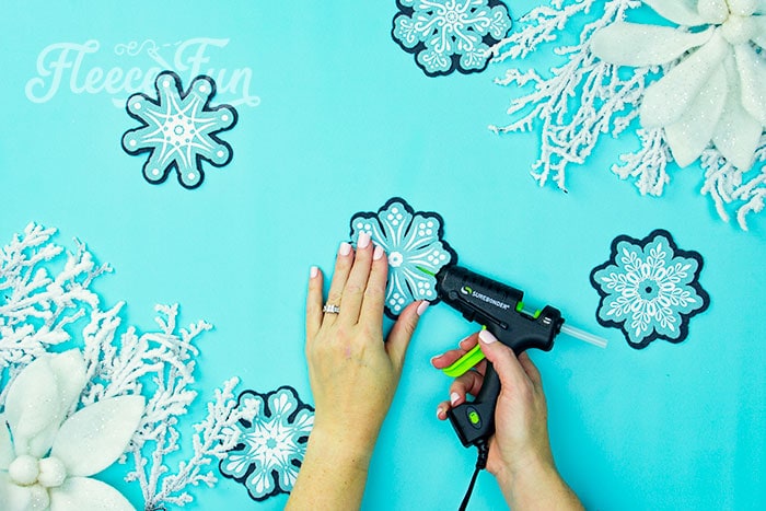 Assembling the fleecefun DIY snowflake ornament pieces