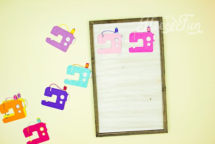 mounting the decor on a frame. This DIY Sewing Room Décor is a happy addition to your creative space! This cute sewing machine pattern and cut file is perfect for décor, ornaments, garland and more! With a few simple materials you can make this decoration for your sewing studio or a friend! I'm providing you with a PDF plus a JPEG if you want to cut it out using a Cricut.