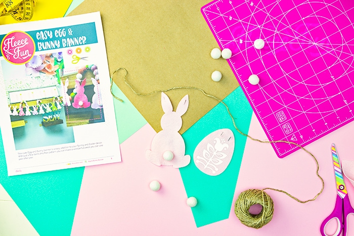 Adding decorative details to the Easter bunny cutouts using fleecefun’s free template and tutorial.