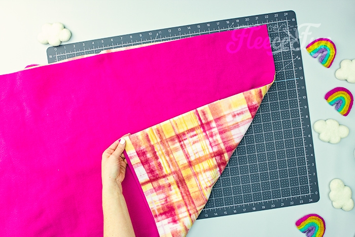laying the fabrics on top of each other