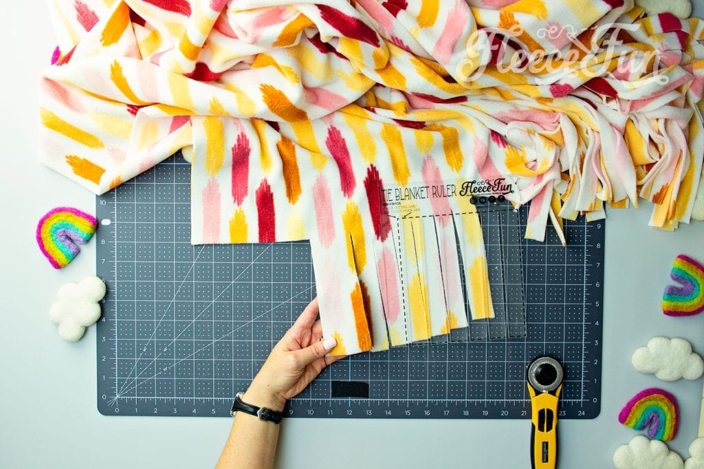 Learn how to cut consistent fleece ties for a no-sew blanket with fleecefun’s step-by-step guide