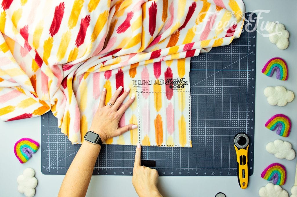placing the ruler on the fabric