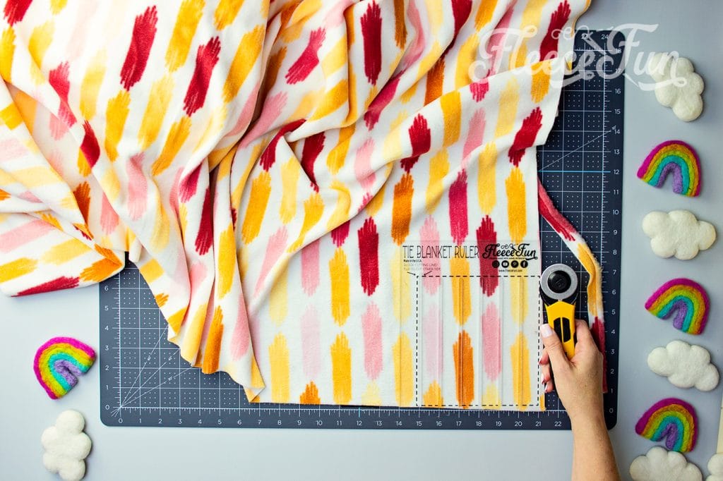 Start your fleece tie blanket by cutting off the selvedges using this fleecefun step-by-step guide