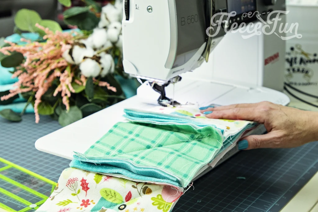 How to sew the rag quilt blocks into rows.