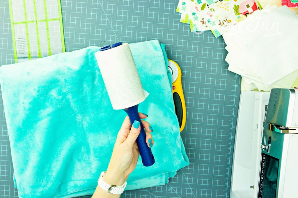 A lint roller come sin handy when dealing with fuzzy fabrics.