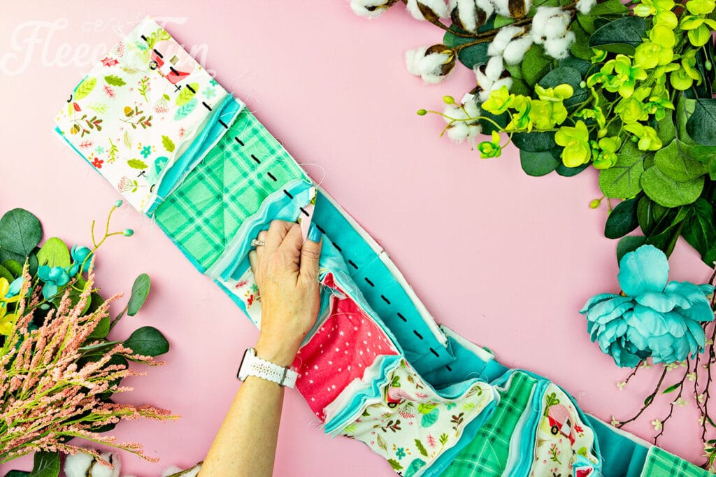 now take the row of blocks and sew the together to build your rag quilt.