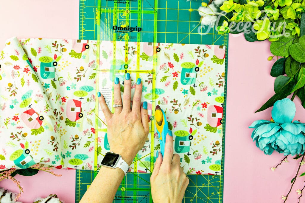 How to cut the blocks for a rag quilt using a rotary blade ruler and mat.