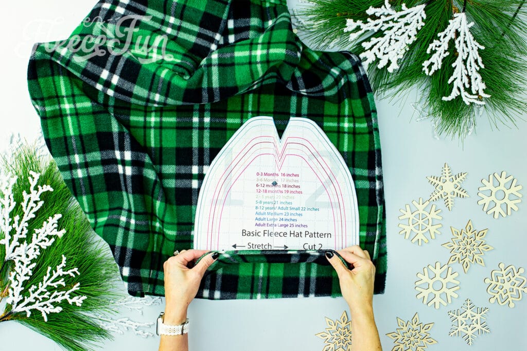 Make sure that the stretch of the fabric is going across the hat before cutting out the free fleece hat pdf pattern..