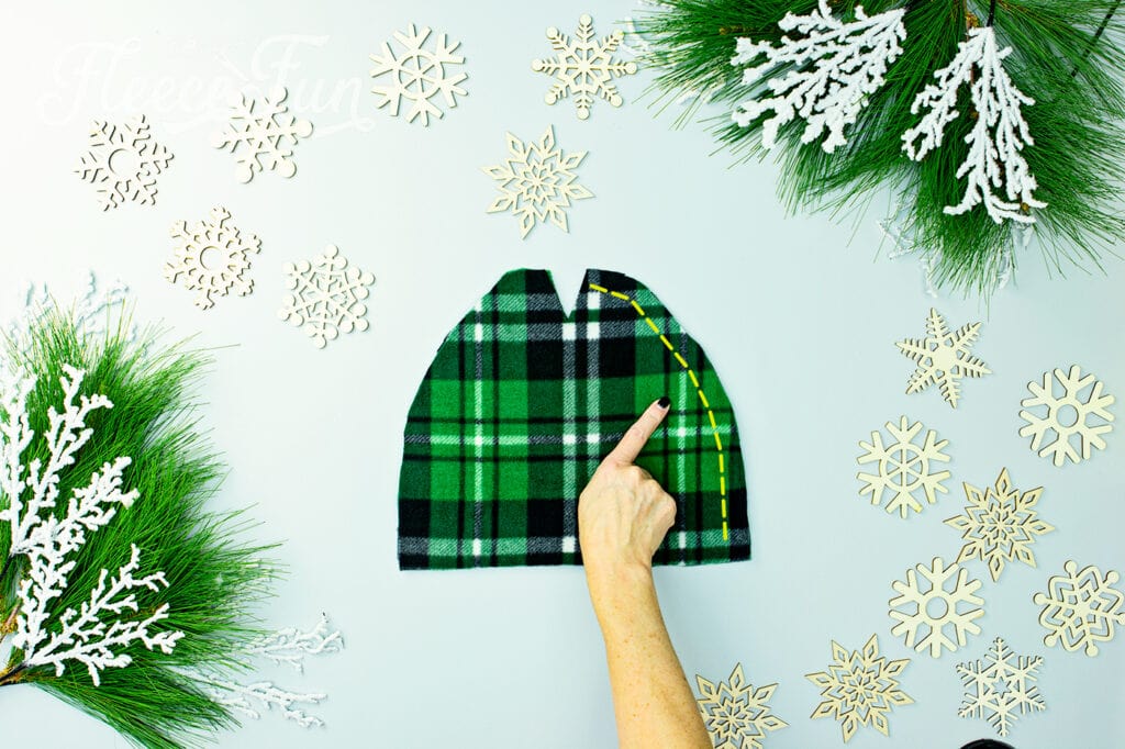 Easy fleece hat pattern one of the four simple seams it takes to make it.  This winter hat comes in sizes baby to adult. Perfect sewing pattern for the whole family.