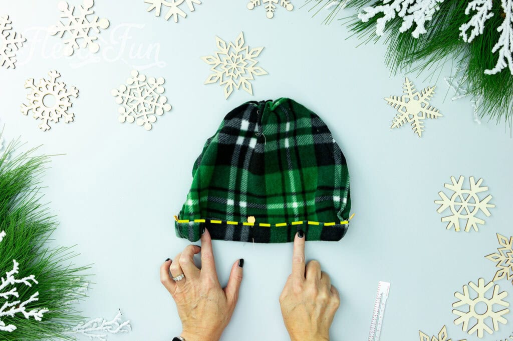 Sew a zig-zag stitch over the edge of the fabric.