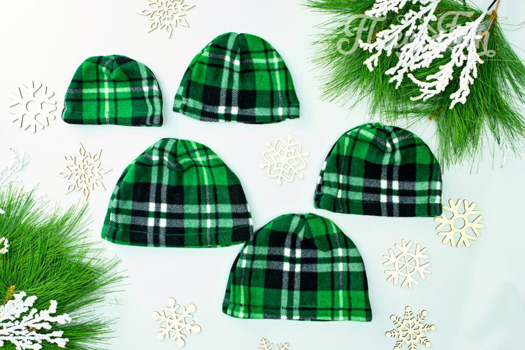 I love this easy basic fleece hat tutorial. I love the free pattern that comes with it. Perfect fleece sewing project. This winter hat comes in sizes baby to adult. Perfect sewing pattern for the whole family. 