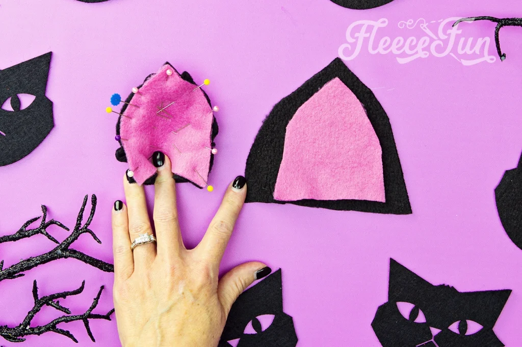 how to pin together the cat ears to the free  fleece hat pattern.