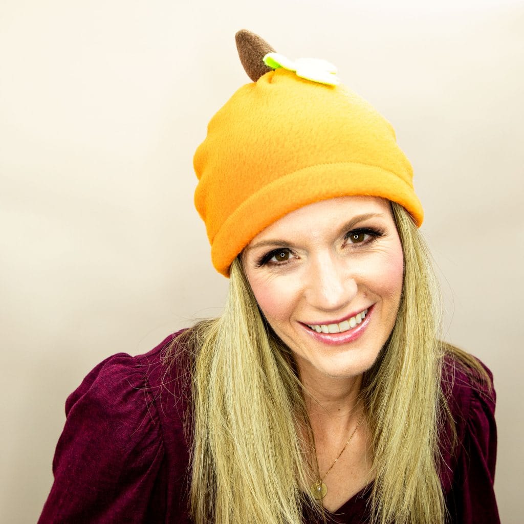 Free fleece pumpkin and apple hat DIY with free fleece  hat pattern is sizes baby, child, teen and adult.