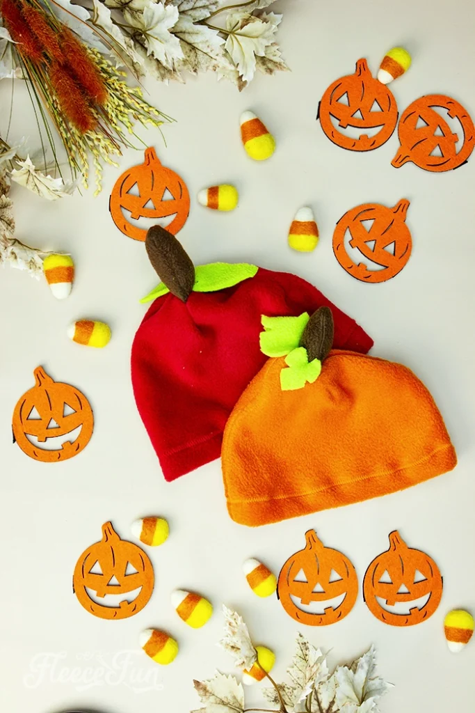 Free fleece pumpkin and apple hat DIY with free fleece  hat pattern is sizes baby, child, teen and adult.