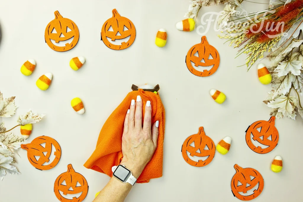 sewing on the top stem to the pumpkin hat pattern.