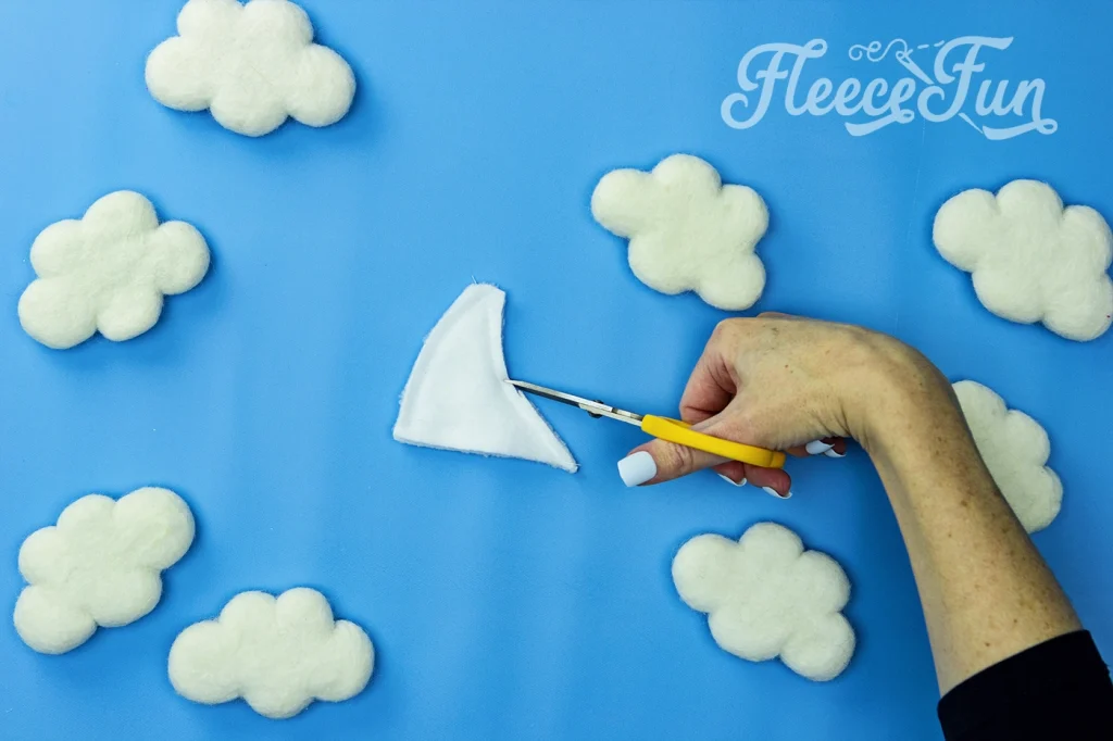 Trim with scissors close to the top point of the horn. Fleecefun guide to cutting out dinosaur hat pieces