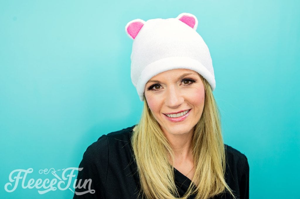 Learn how to make a fleece hat with cute bear ears. This tutorial comes with a free fleece hat pdf sewing pattern sizes baby to adult.