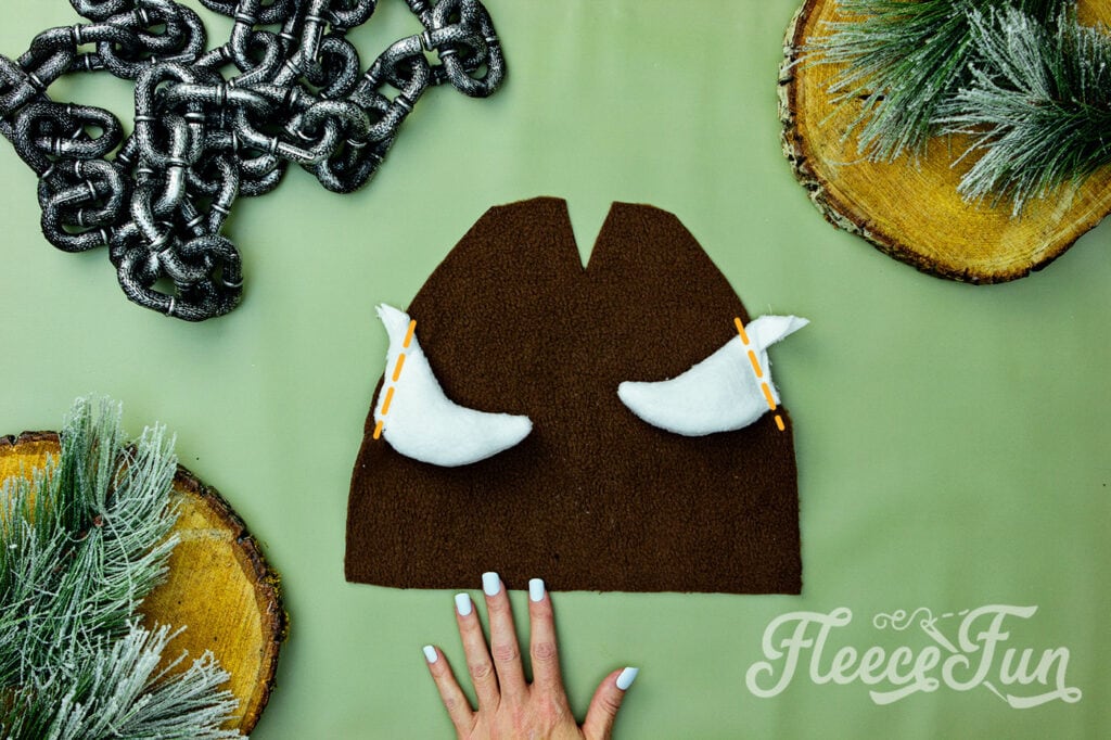 Step 3 - Attach the horns and sew the hat sides