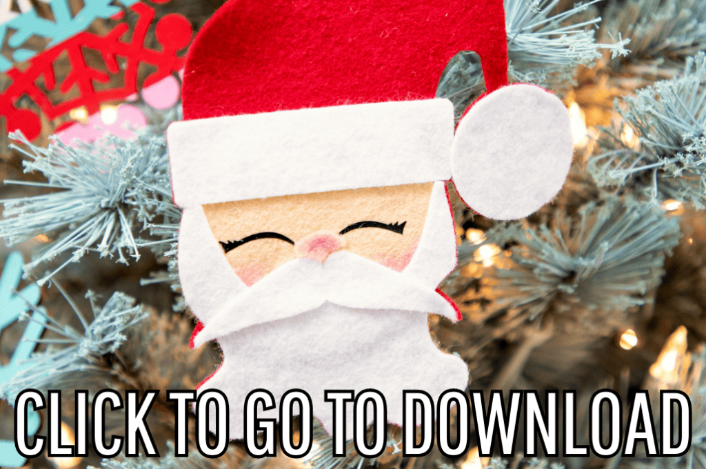 A felt Santa Claus ornament made with fleecefun.com's free tutorial and pattern is hanging on a Christmas tree, surrounded by decorations, with the text "CLICK TO GO TO DOWNLOAD" displayed at the bottom.