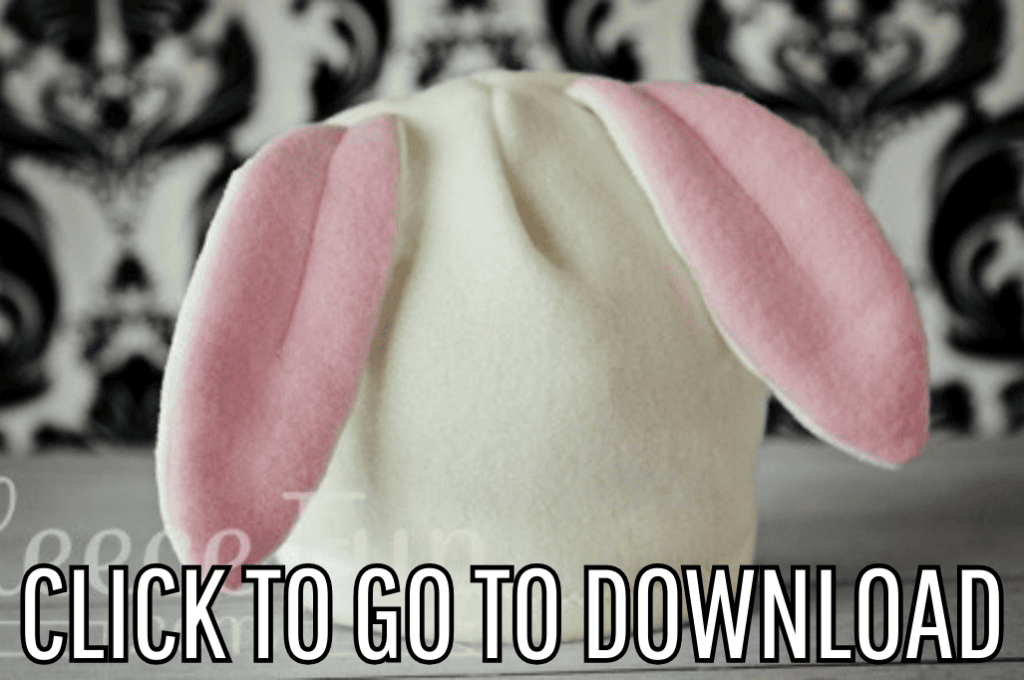 a fleece hat with bunny ears, perfect for halloween and winter, made with free pattern and step by step tutorial from fleece fun, with the text "CLICK TO GO TO DOWNLOAD" displayed at the bottom.