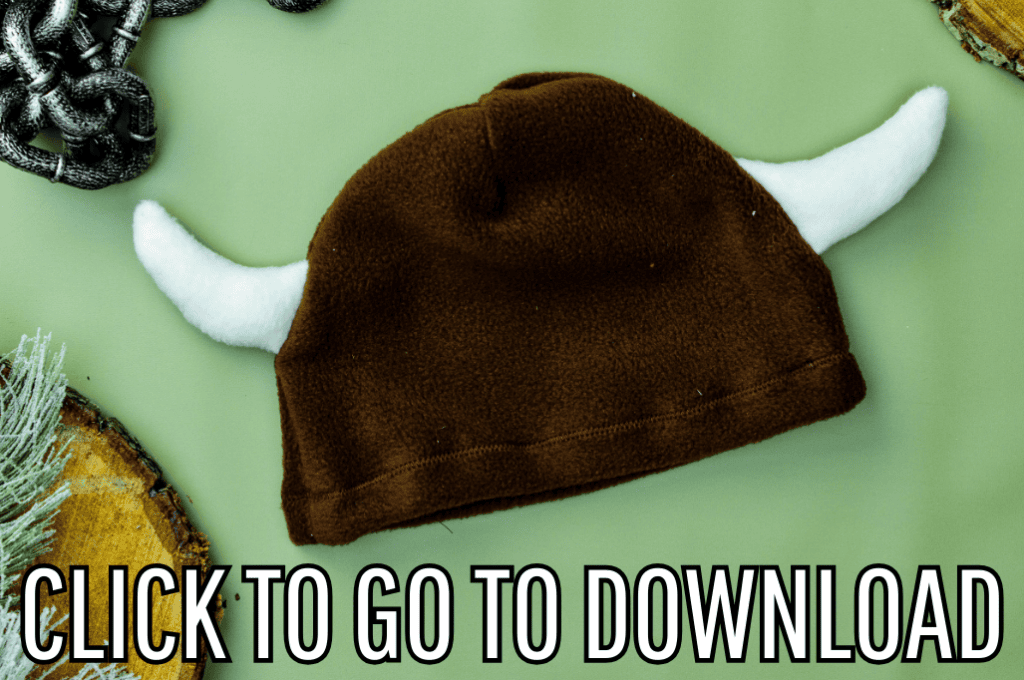 a fleece hat with horns, designed after viking helmets, perfect for halloween and winter, made with free pattern and step by step tutorial from fleece fun, with the text "CLICK TO GO TO DOWNLOAD" displayed at the bottom.
