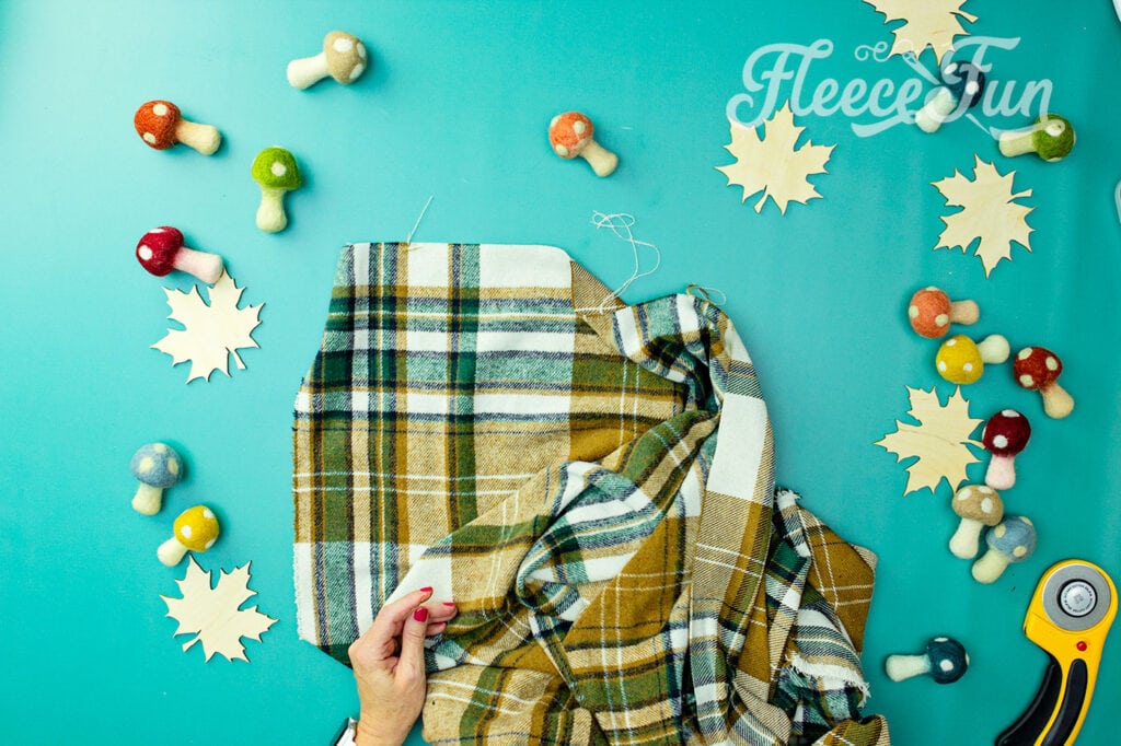 fabric that is opposite the fold and has a slightly different texture than the rest of the fabric