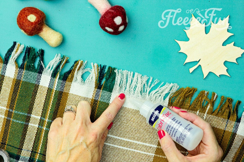 Pushing the glue in between the fibers