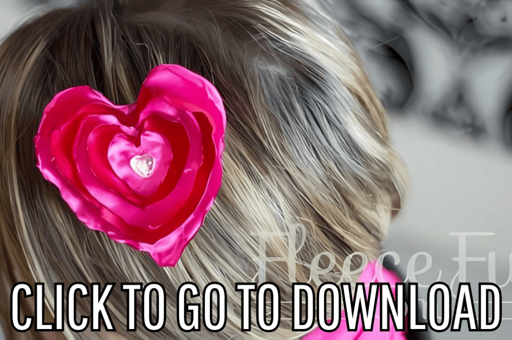 
A no sew satin heart clip, made with free pattern and step by step tutorial from fleece fun, with the text "CLICK TO GO TO DOWNLOAD" displayed at the bottom.