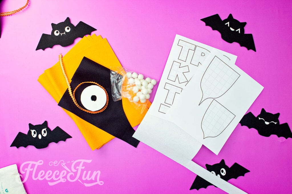 Step-by-step guide to making a Trick or Treat banner using fleecefun’s free template.