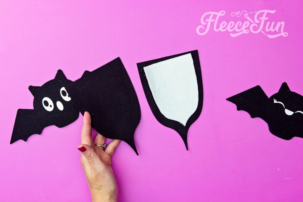 Assembling the flags for the Trick or Treat banner with fleecefun's free template and tutorial.