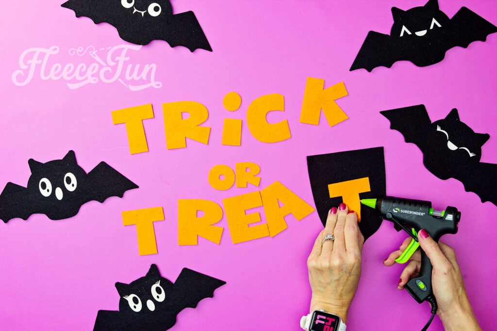 DIY Trick or Treat banner with letters from fleecefun’s free template and tutorial.