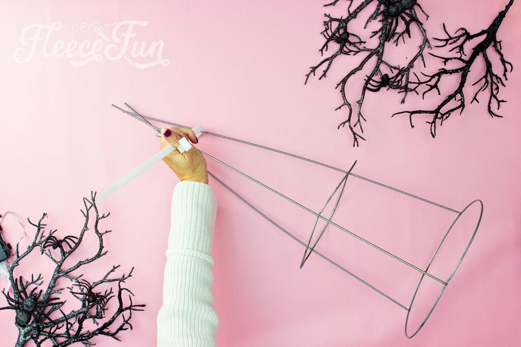 Start your Tomato Cage Ghost project by prepping the frame with fleecefun’s free template and tutorial