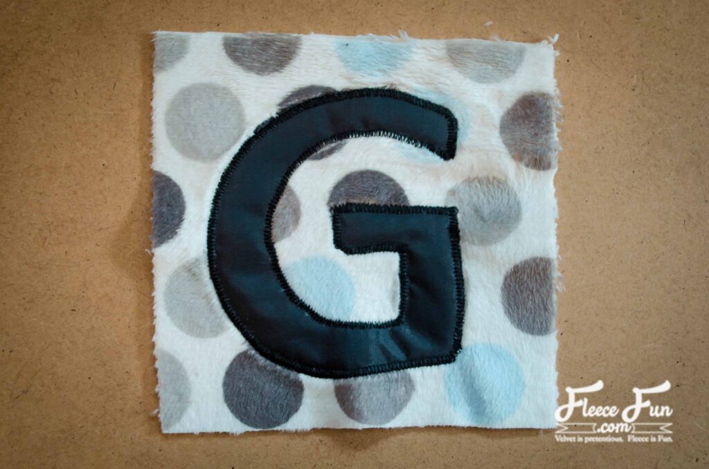 sewing the letter. I love these giant blocks you can make for baby. So cute and a great DIY idea for a baby to play with. Love sewing for baby.