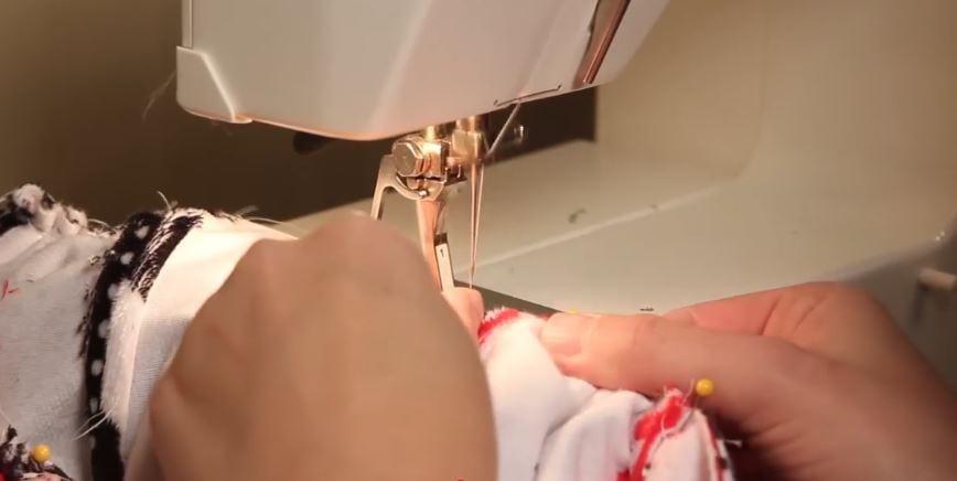 Sewing each side with a half-inch allowance.