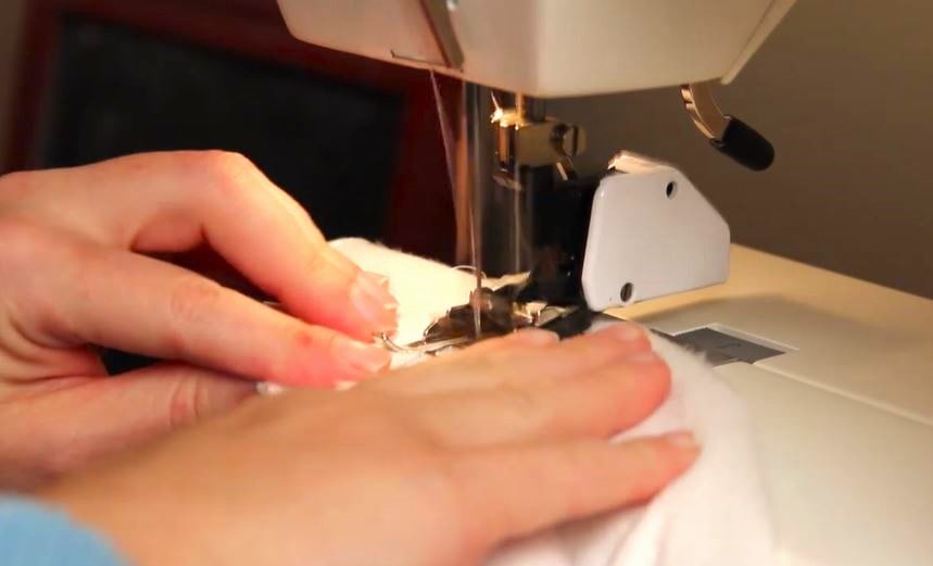 Sewing a seam.
