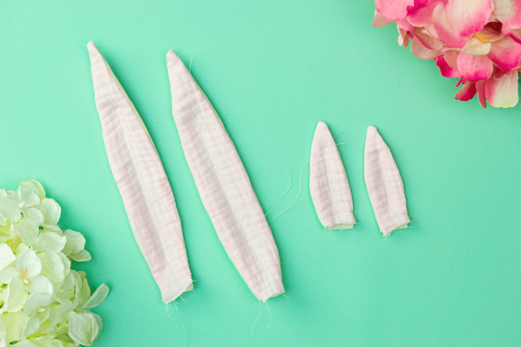 Close-up of topstitched bunny ears showing the long and short ear options